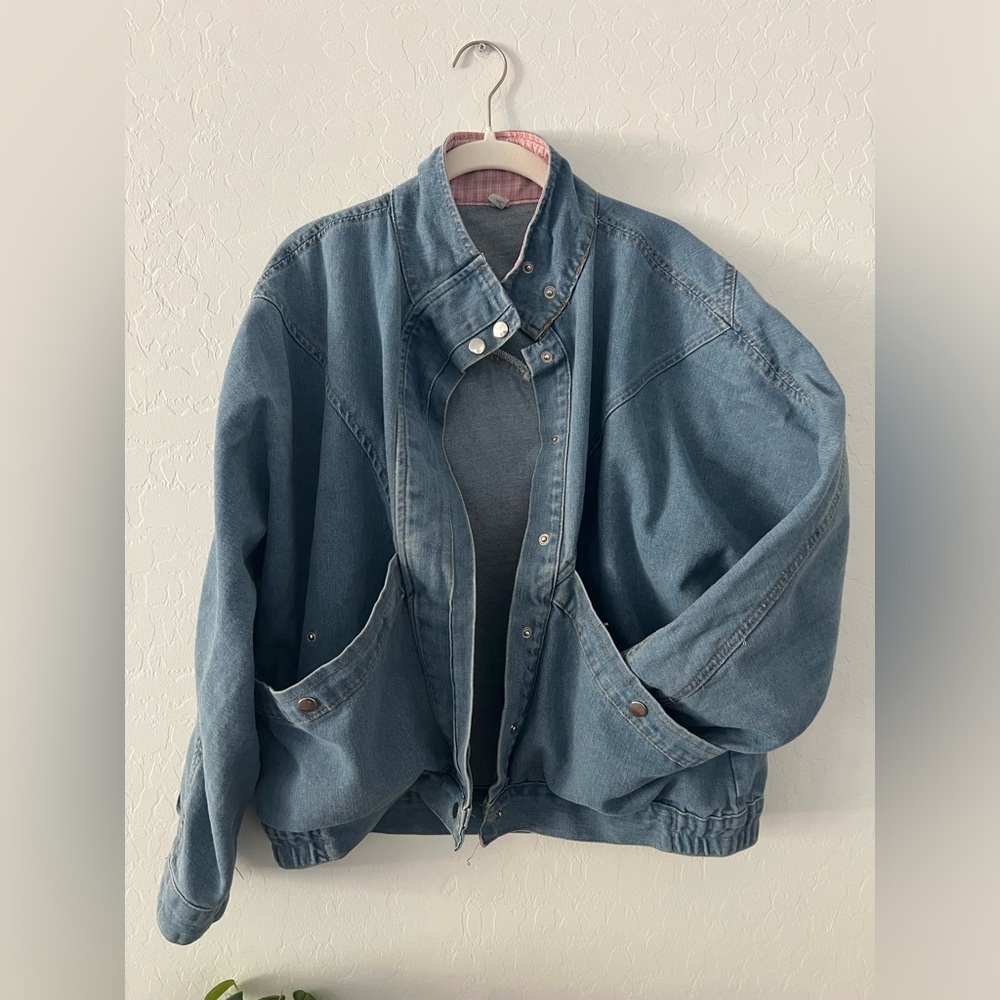 Oversized denim jacket with snaps and pink plaid lining